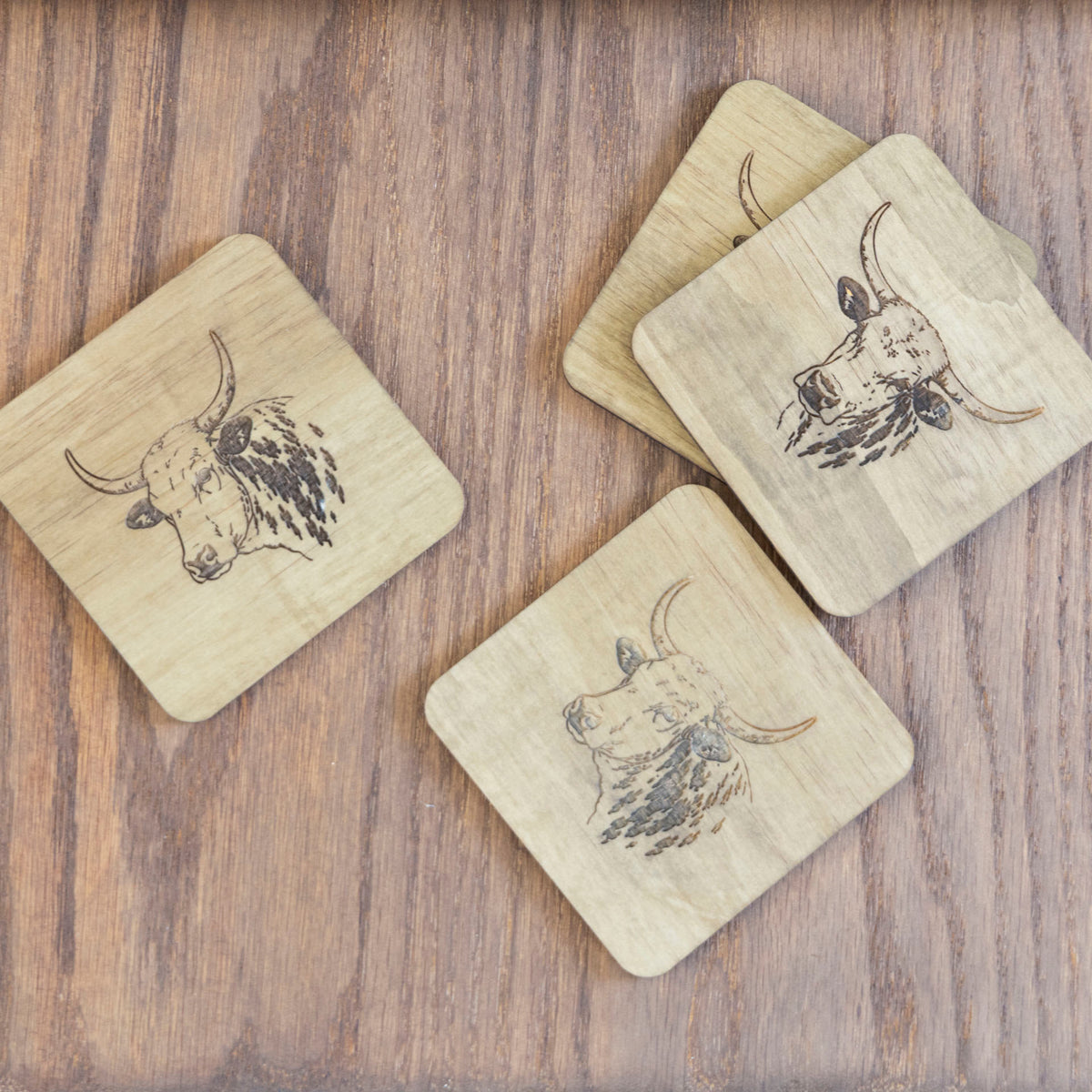 Wooden Nguni Coasters with Stands (set of 4)