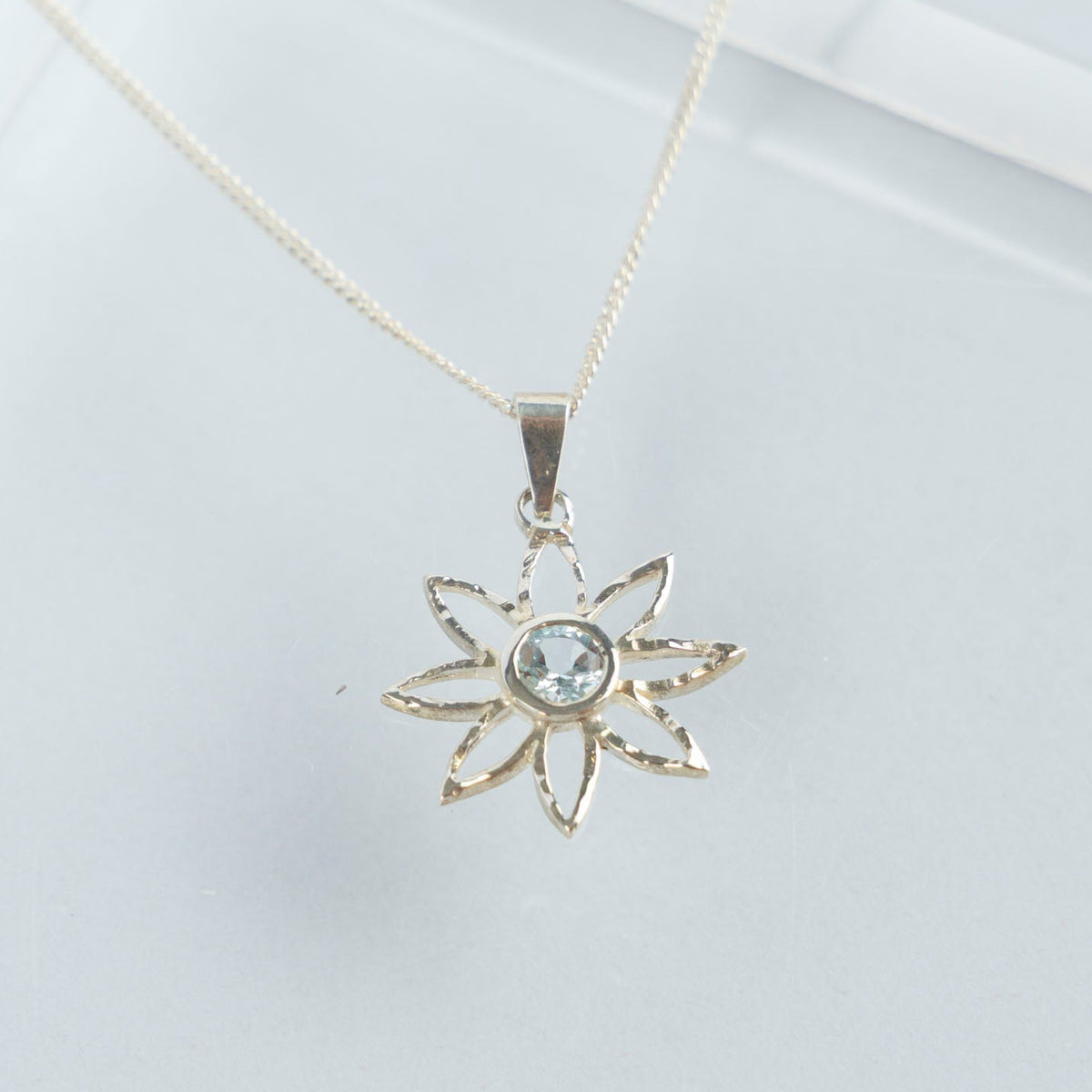 Sterling Silver and Blue Topaz Floral Necklace