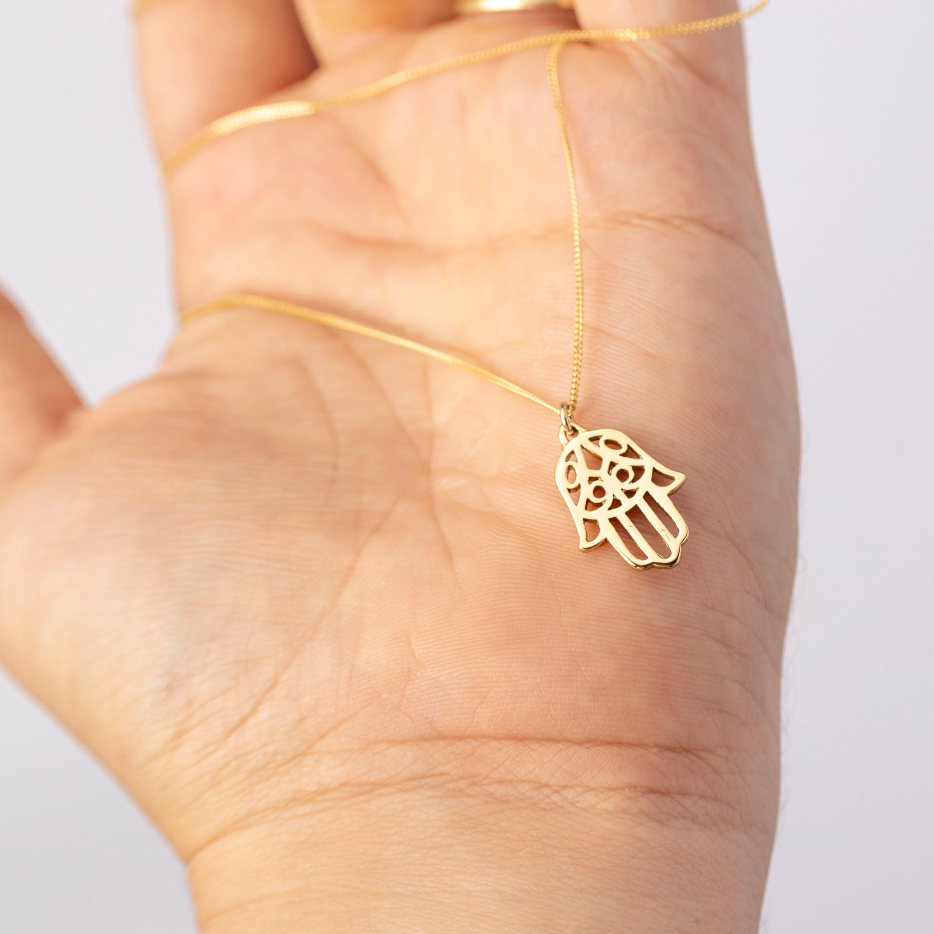 "Abundance" Gold-Dipped Hamsa Necklace