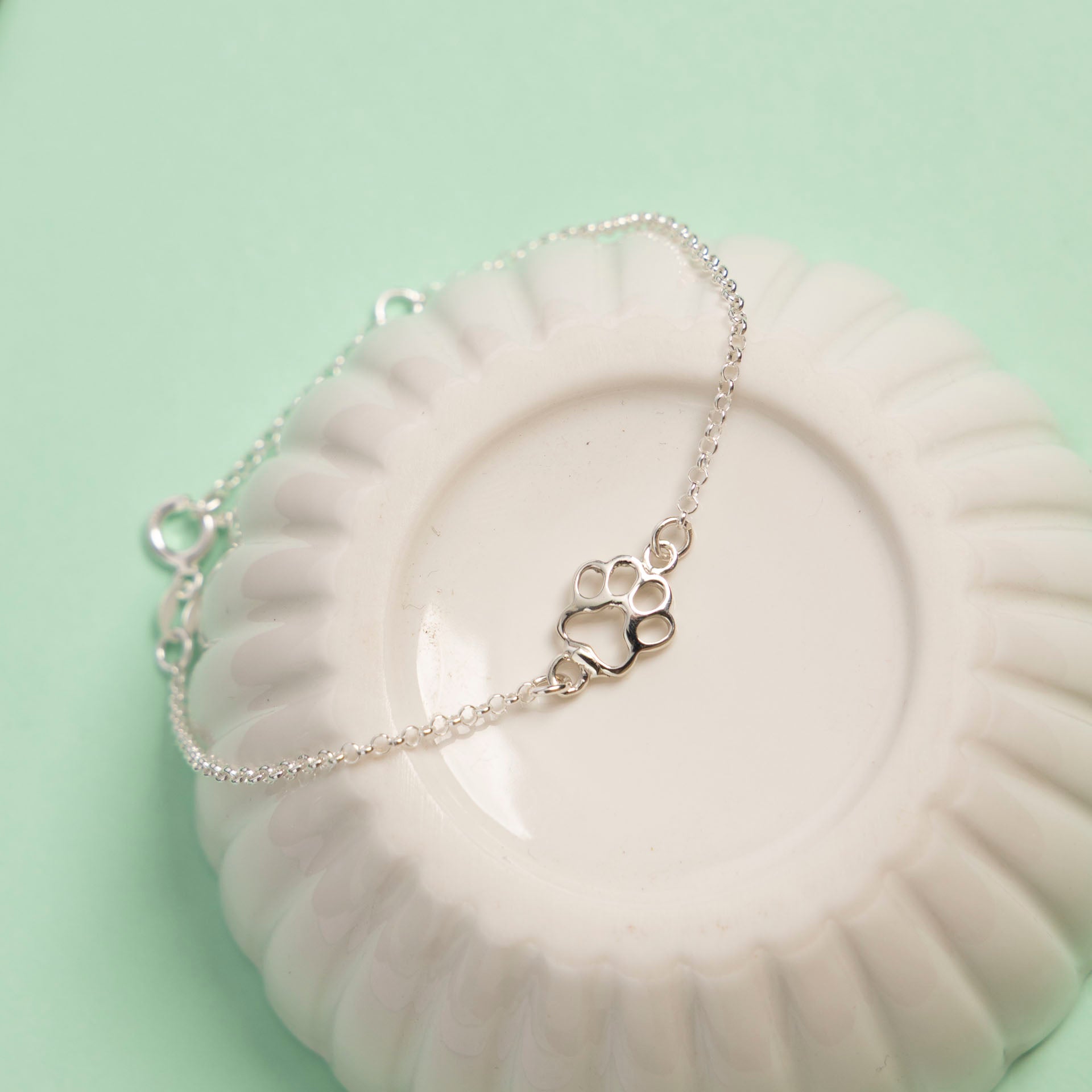 "Merry Woofmas" Paw Print Bracelet (sterling silver or gold-dipped)