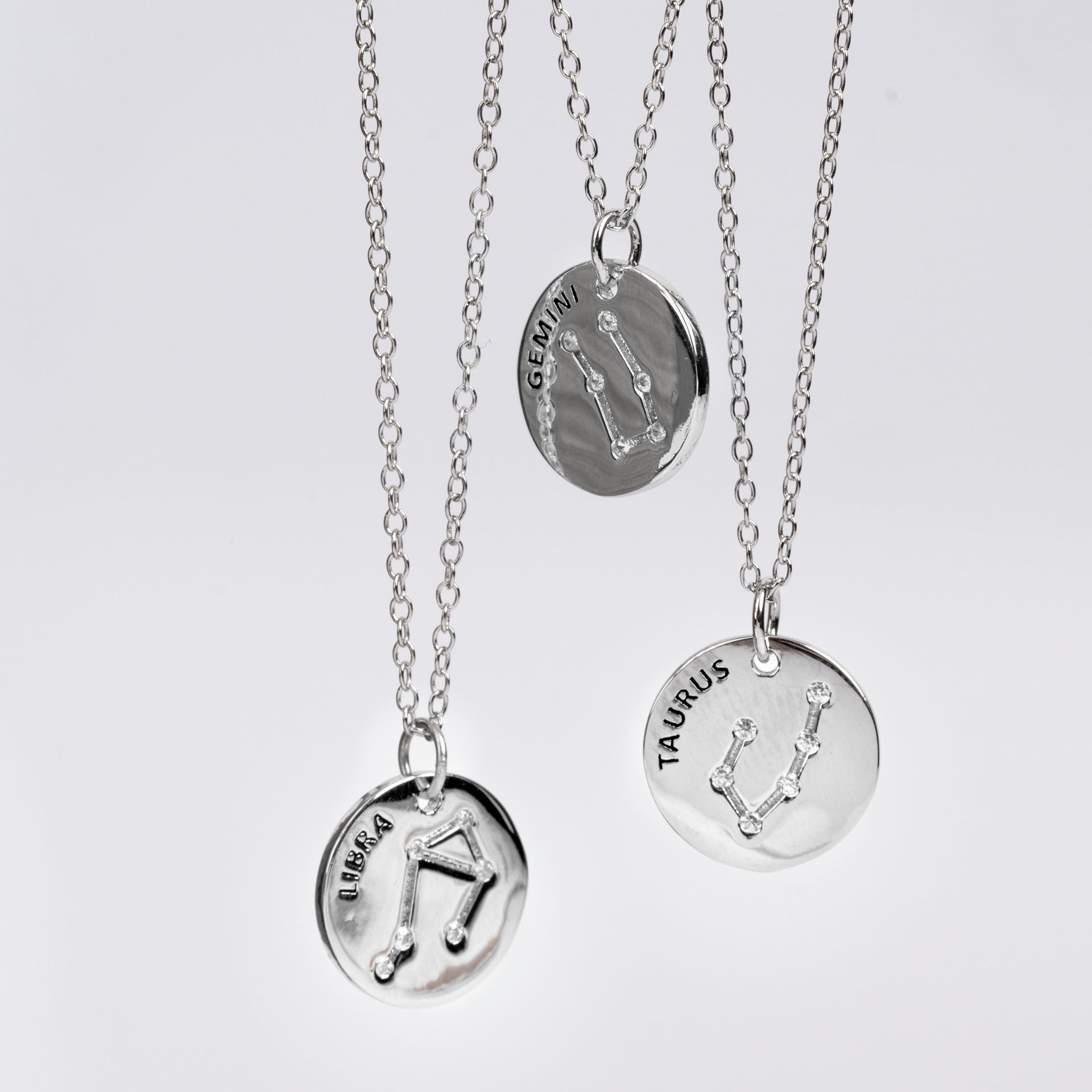 Sterling Silver Star Sign Necklaces (with Zodiac Info Backing Card)