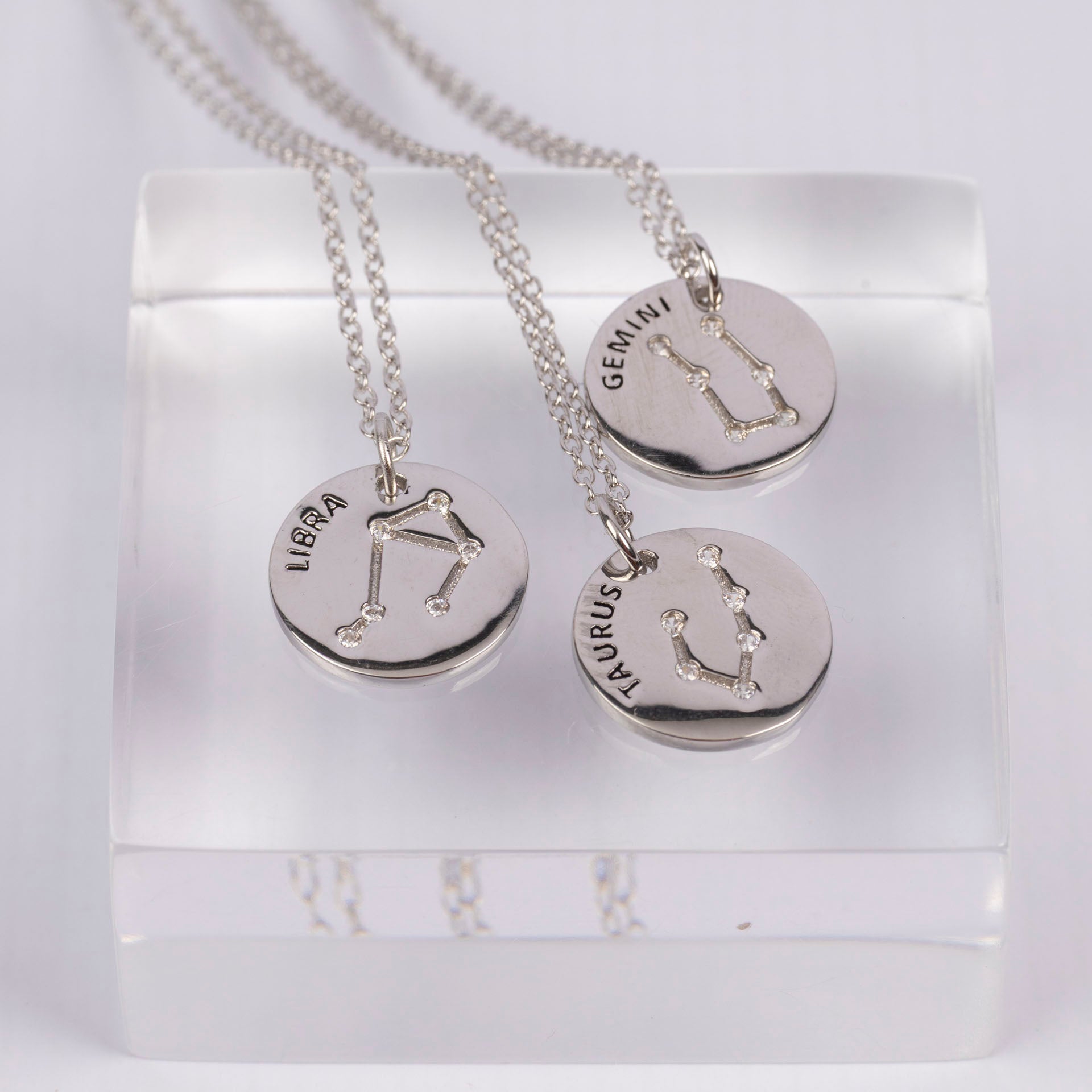 Sterling Silver Star Sign Necklaces (with Zodiac Info Backing Card)