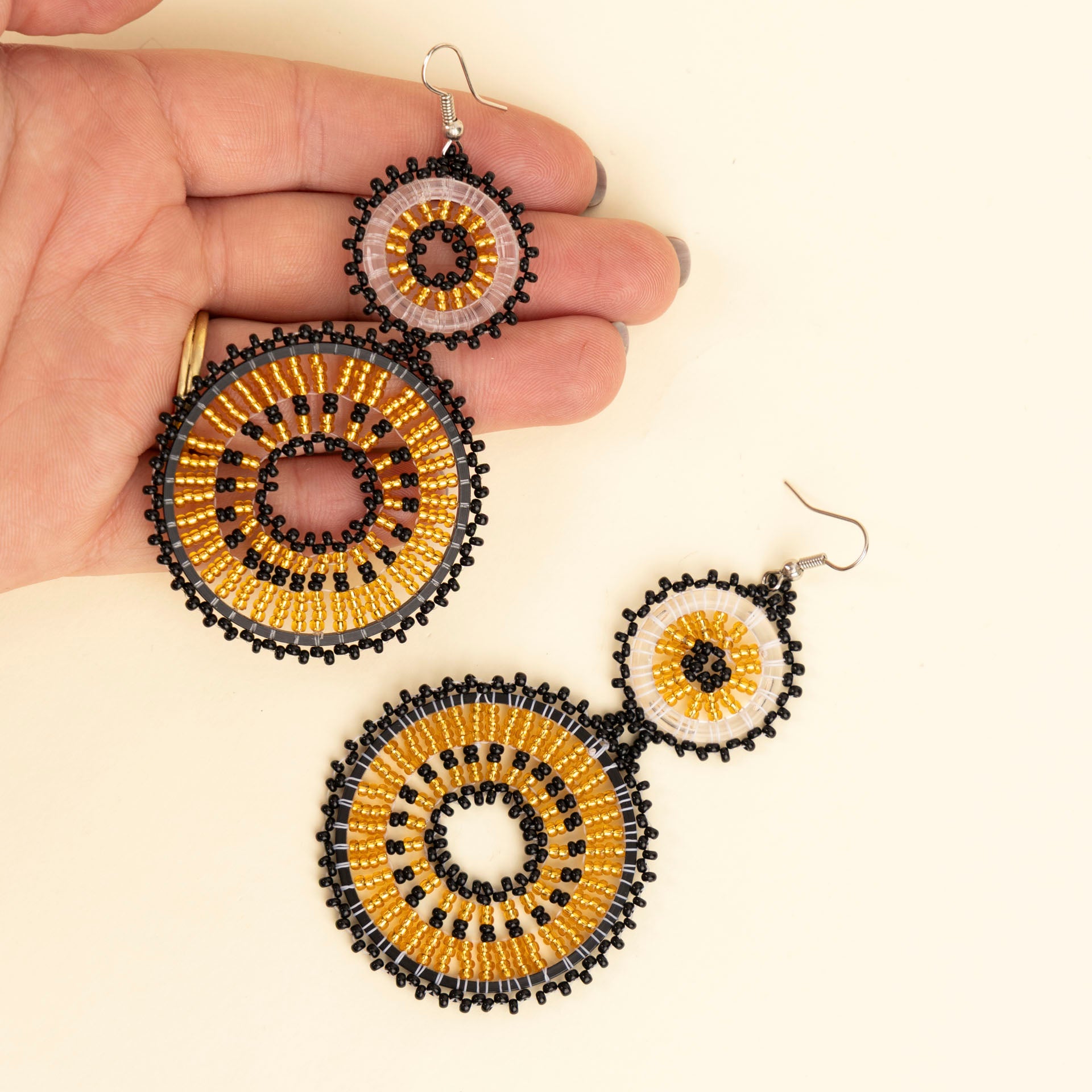 Black & Gold Beaded Double Hoop Earrings by Project Hope