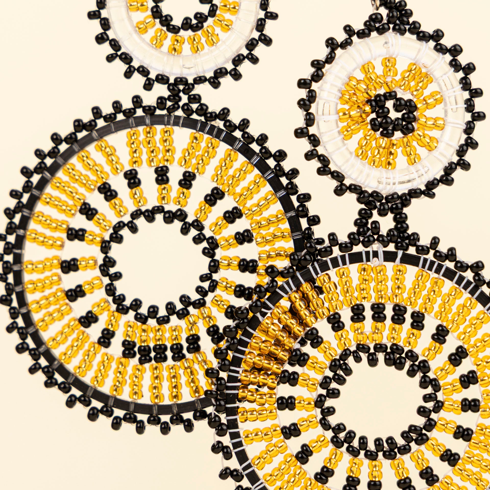 Black & Gold Beaded Double Hoop Earrings by Project Hope